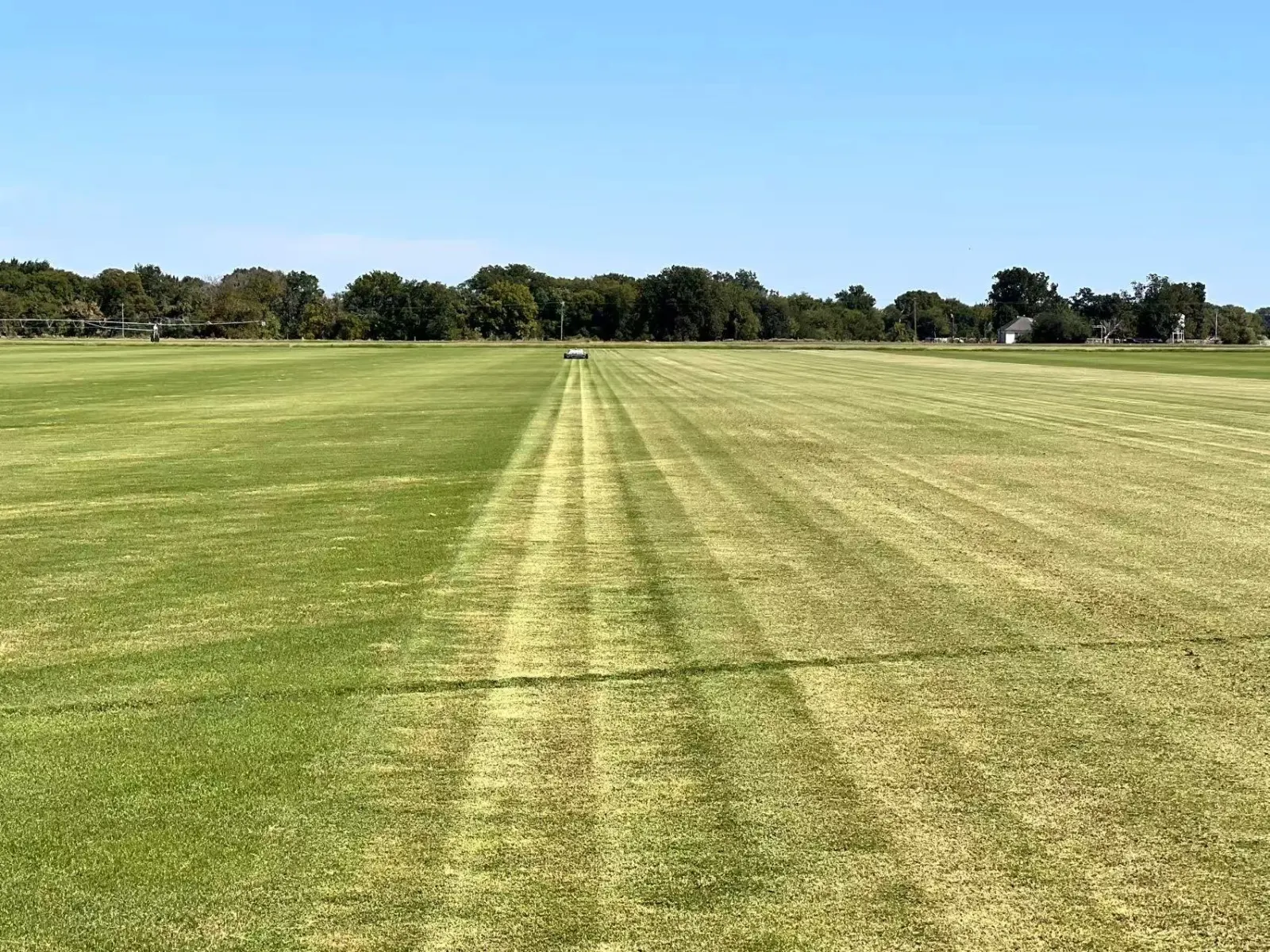 Wide field striped in straight parallel passes by an Amotrol A60i autonomous mower